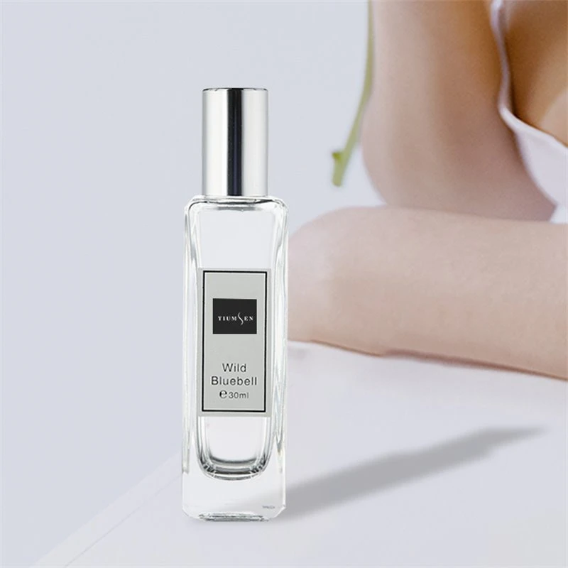 perfume with a rose on the bottle